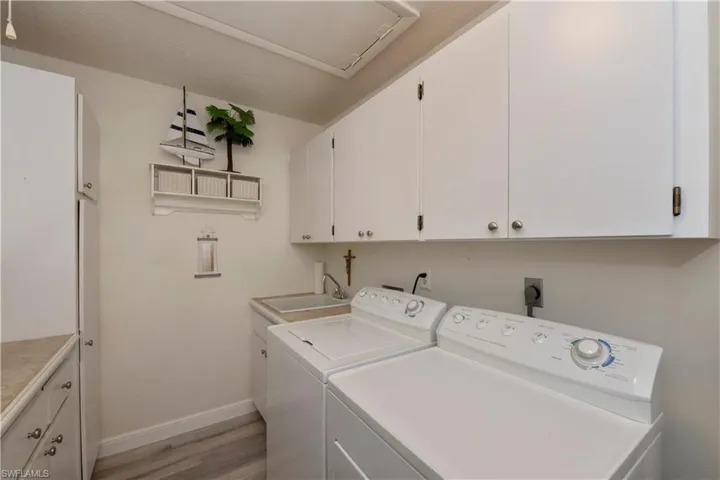 Large laundry room with plenty of storage