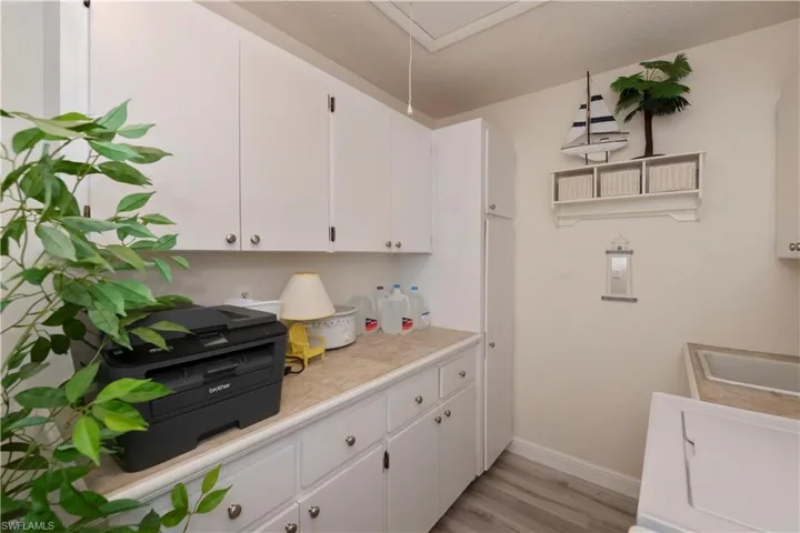 Cabinets galore in the laundry room