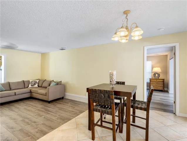 Dining area toward living room and Primary BR to right