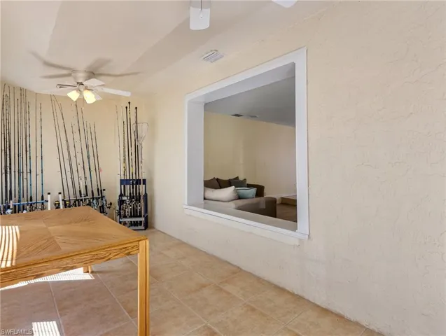 Bonus/Hobby room at front of home with separate entry