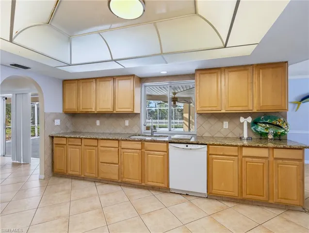 Kitchen with pass thru to lanai