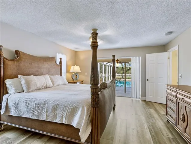Primary Bedroom with sliders to the lanai