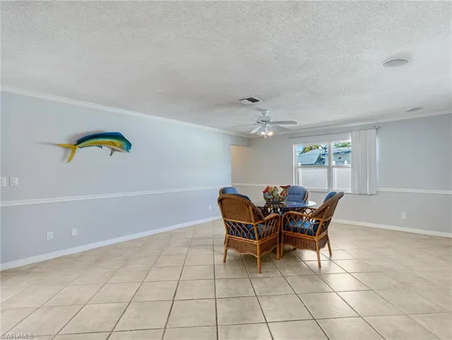 Family room, at the back is the hallway to the guest bedrooms