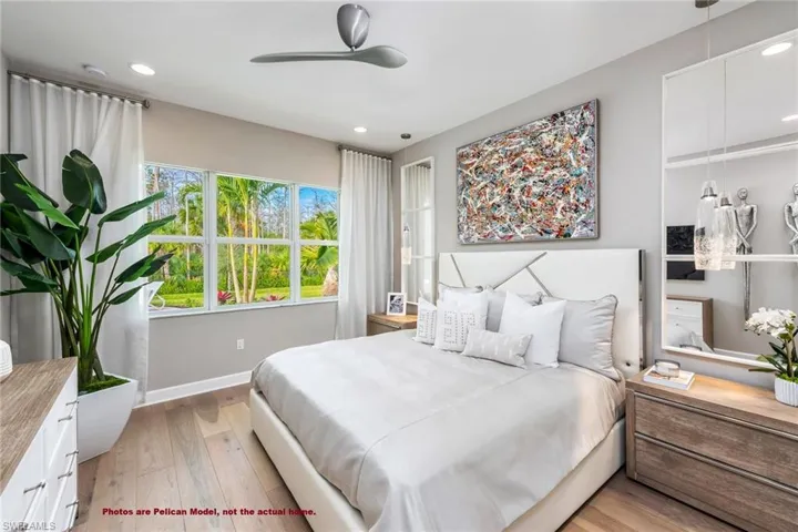 Bedroom with light hardwood / wood-style floors