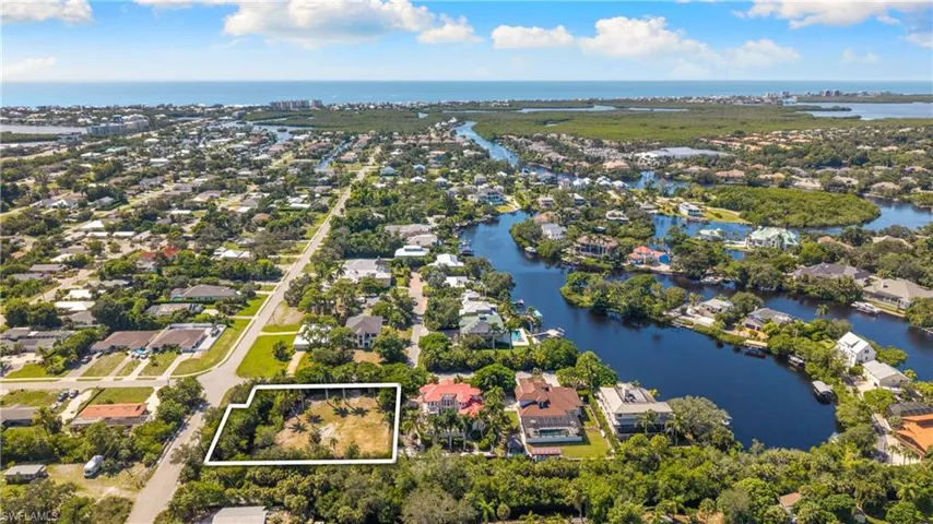 Expansive lot with mature trees, surrounded by established residential properties
