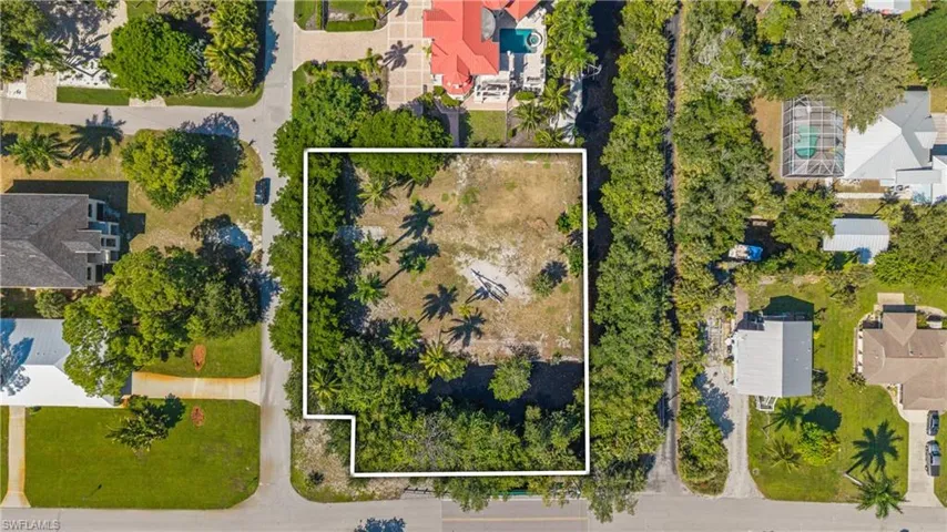 Generous lot with mature trees and established perimeter landscaping