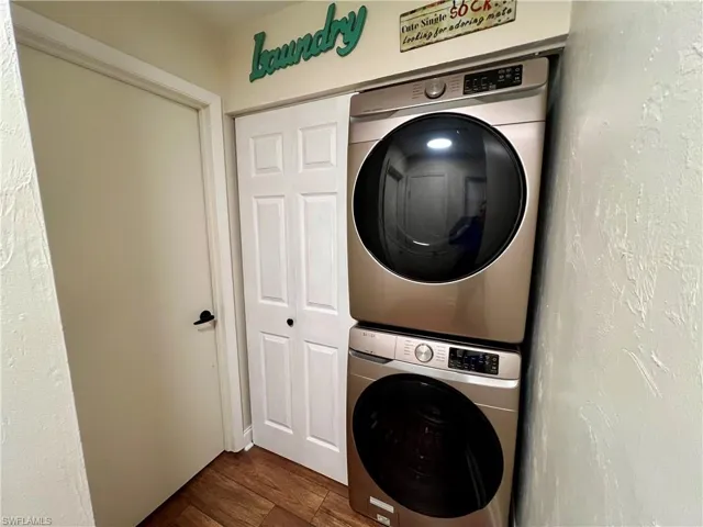 Clothes washing area with stacked washer