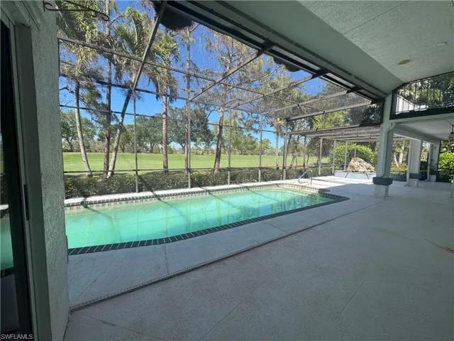 View to the NE. Note: balcony above to the right overlooking the golf course and the Koi pond in the far right area 80' away in the lanai.