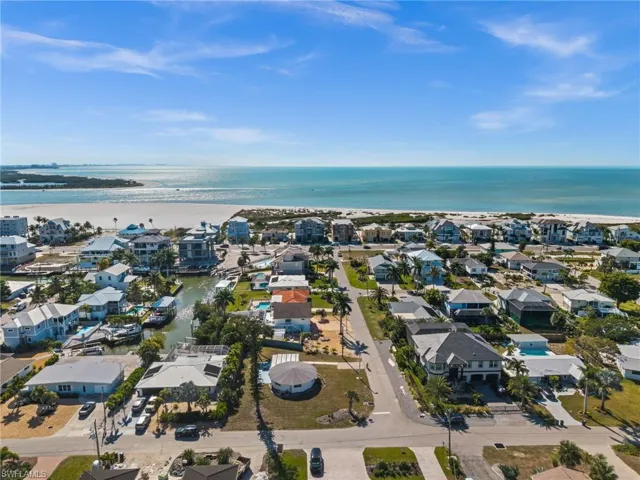 Aerial view of residential area with a nearby body of water