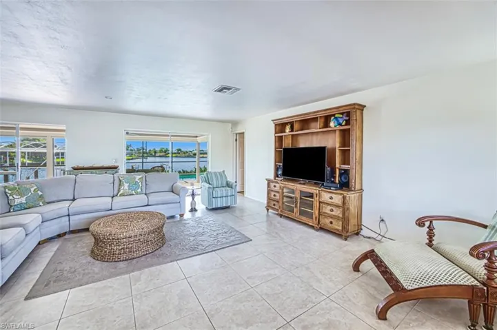 Living room with light tile floors