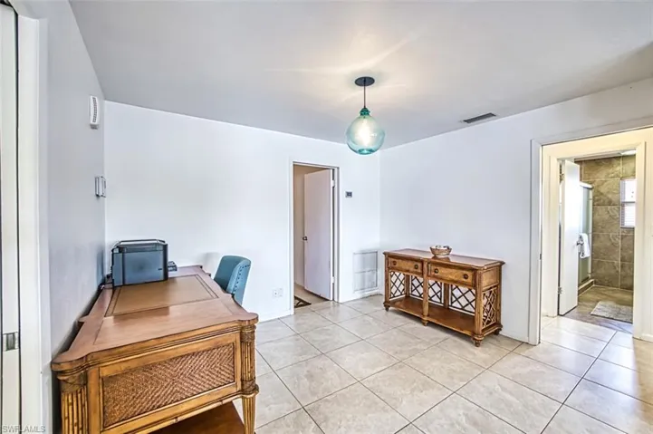 Office featuring light tile flooring