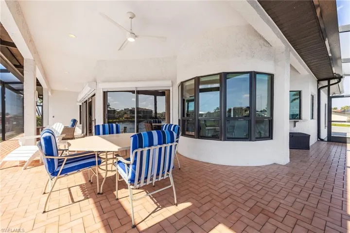 View of patio with ceiling fan