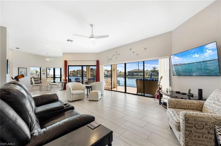 Living room featuring ceiling fan