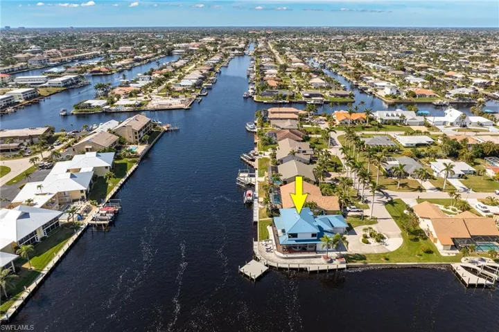 Drone / aerial view featuring a water view going west