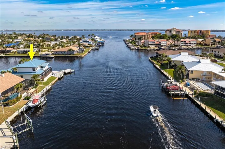 Aerial view featuring quick access to the river
