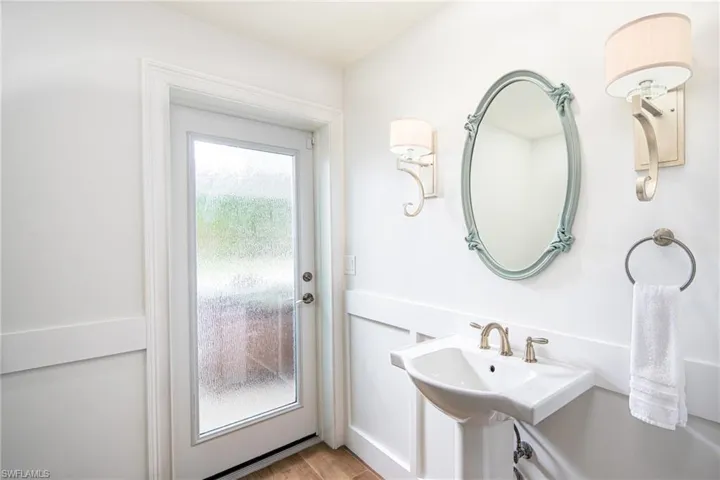 Bathroom with wood finished floors