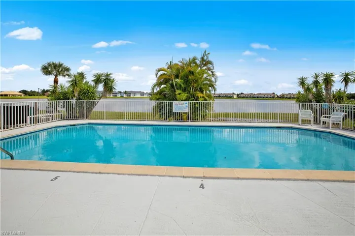 refreshing inground pool with beautiful lake view