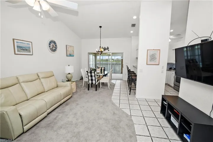 open floor plan with living, dining and kitchen all with great views