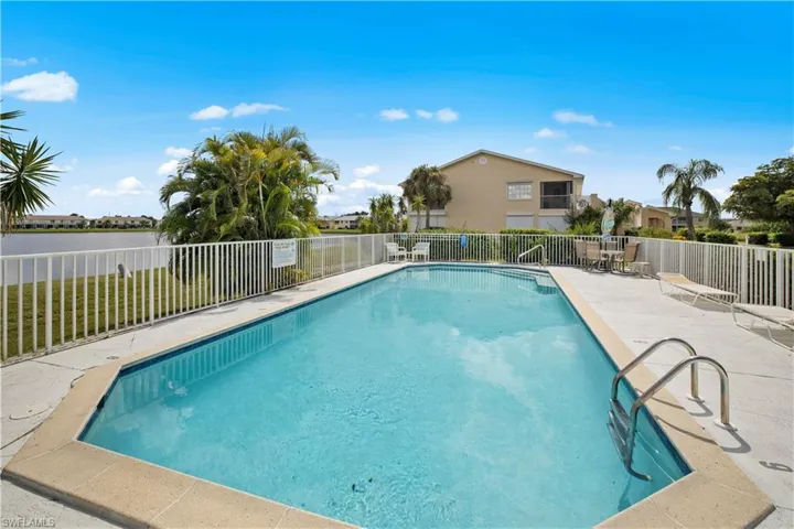 refreshing inground pool with beautiful lake view