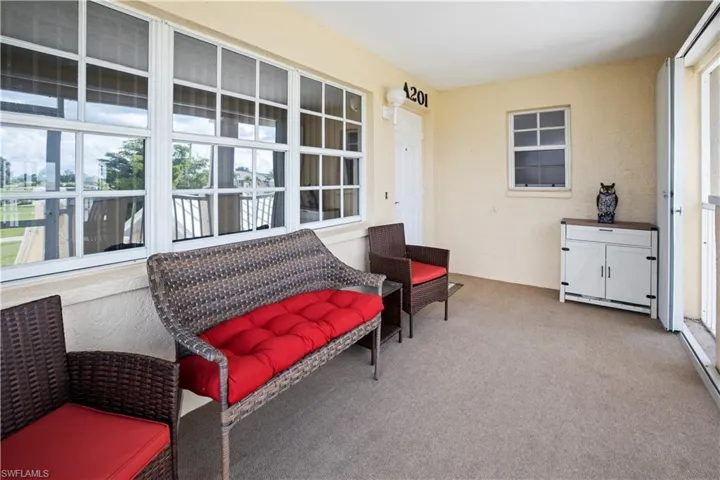 arge 15ft screened front entry with accordian shutters