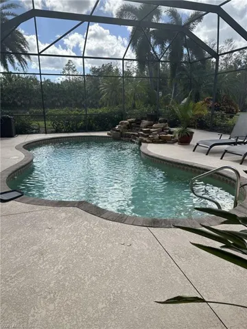 View of pool featuring a lanai and a patio