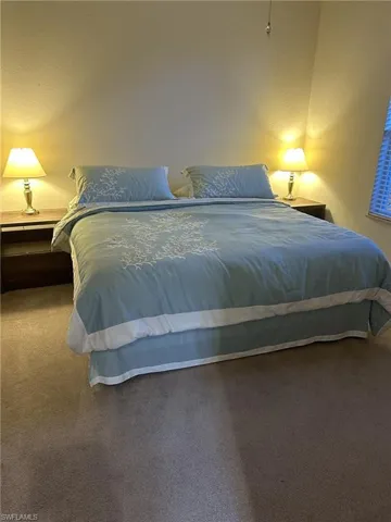 Bedroom featuring carpet