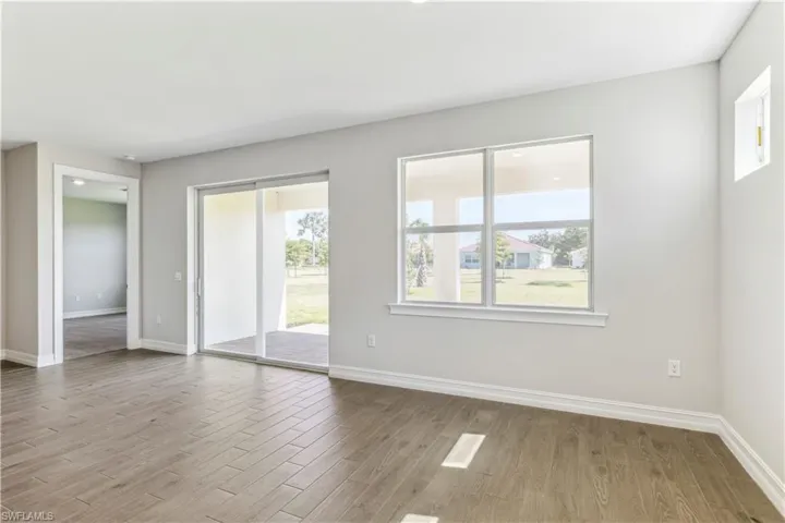 Empty room with light wood-type flooring