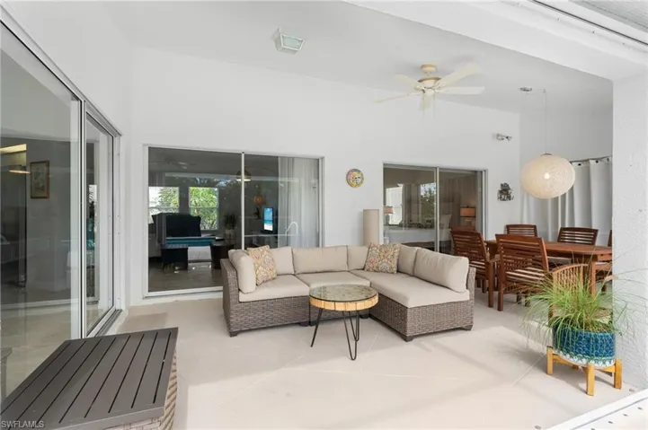 Living room featuring plenty of natural light and ceiling fan