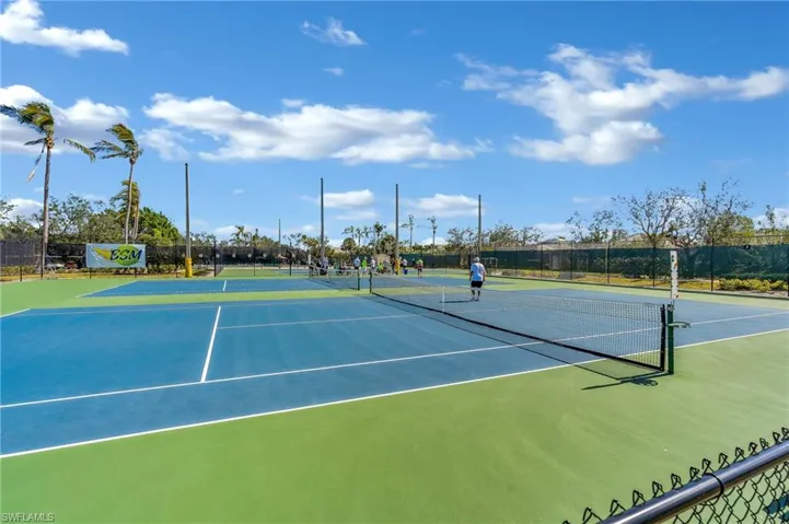 View of sport court with community basketball court and fence