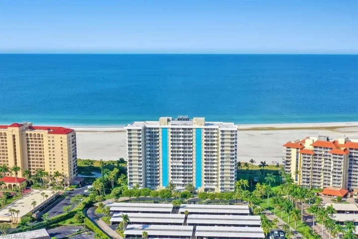 Aerial view with a view of the beach and a water view