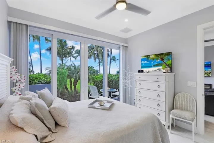 Bedroom featuring visible vents, recessed lighting, marble finish floor, access to outside, and ceiling fan