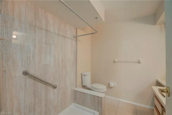 Full bath with vanity, a new shower in master bath.