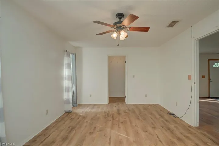 master bedroom with closet entrance