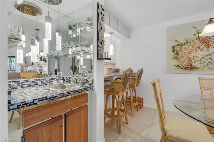 Custom designed wet bar and breakfast bar area