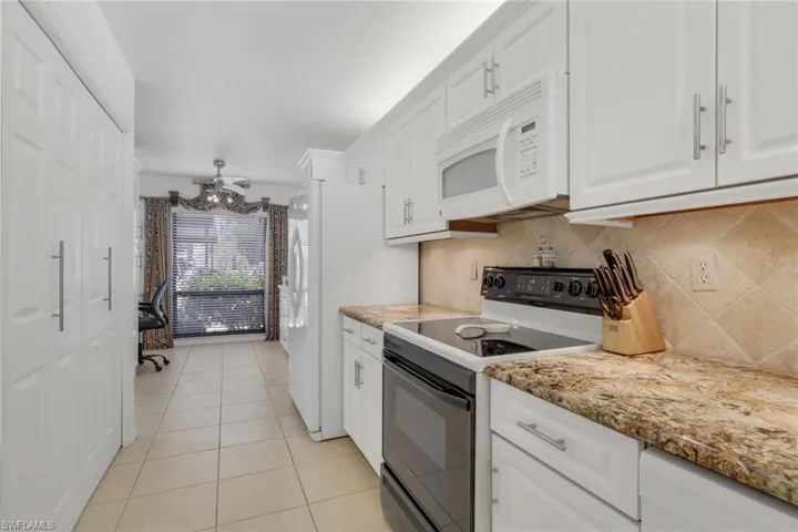 Kitchen with updated laundry closet