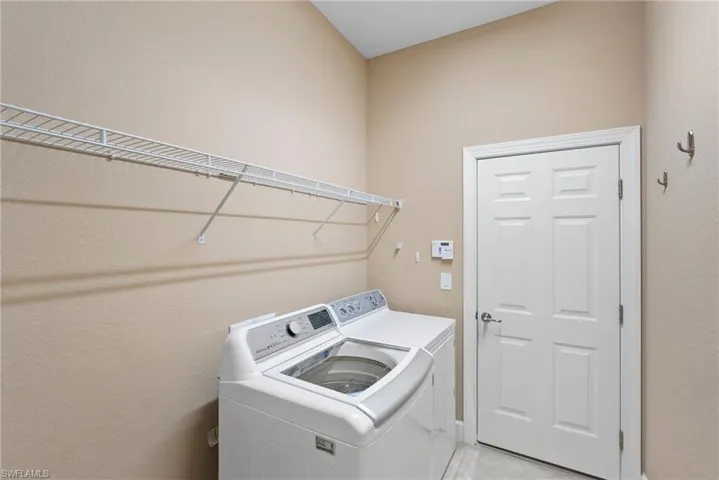 Laundry room with washer and dryer
