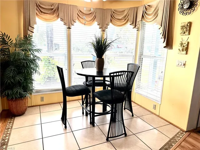 Breakfast nook featuring a healthy amount of sunlight