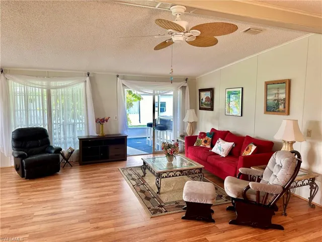 Living room light wood-style flooring