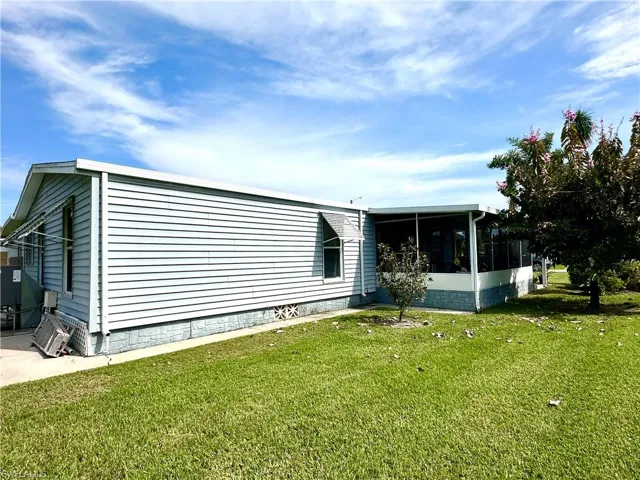 View of side of property featuring a spacious lot