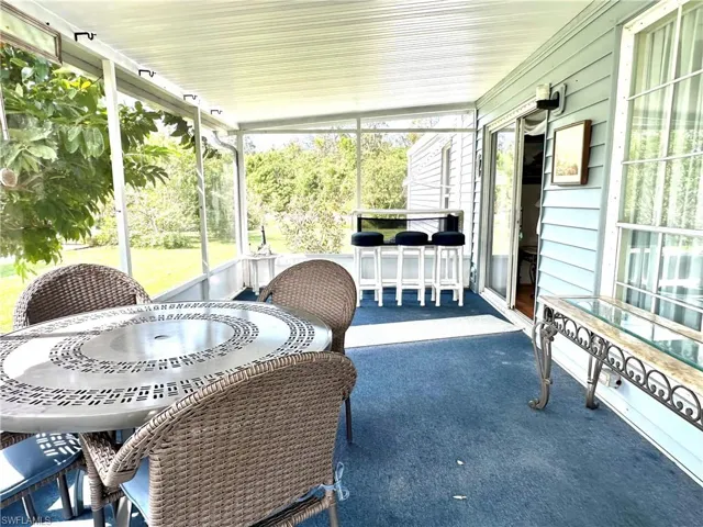 Screened lanai with spacious backyard