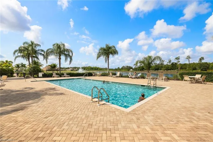 Community pool featuring a patio area
