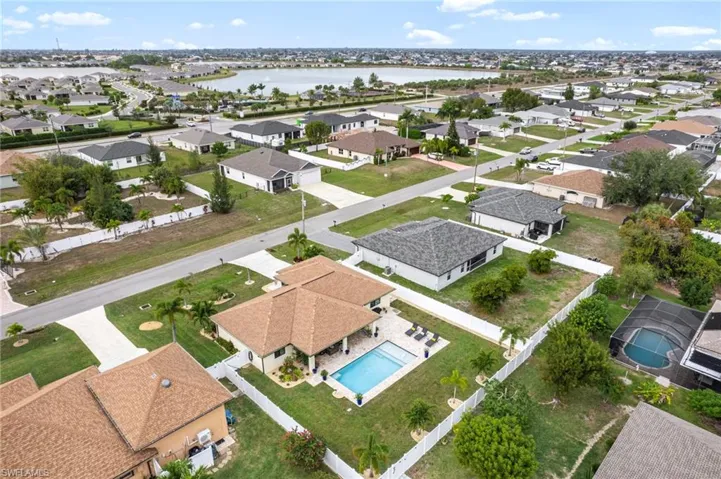 Aerial view of residential area with a nearby body of water