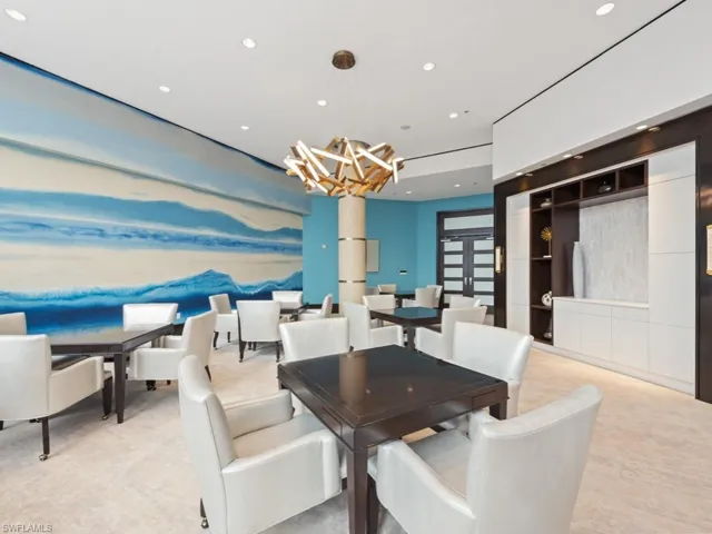 Dining space with a chandelier