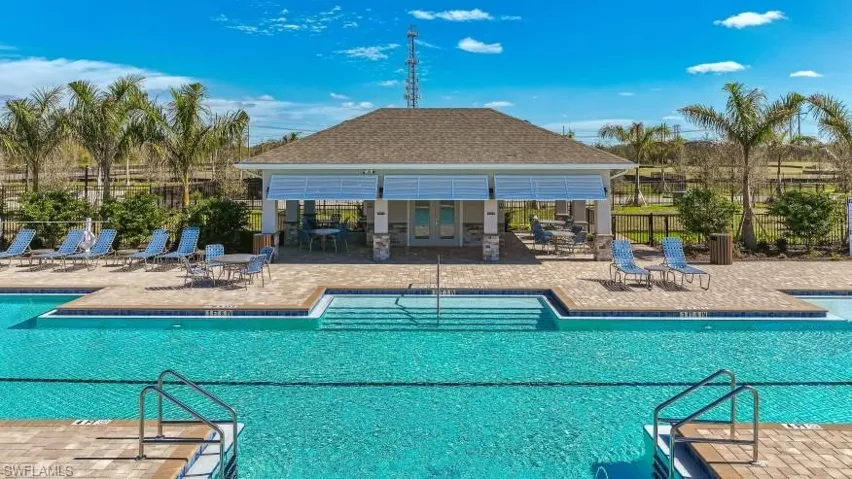 View of swimming pool with a patio area