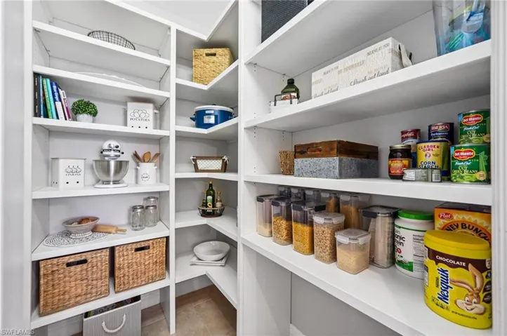 You Will Love This Walk-In Pantry With New Custom Wood Shelving!