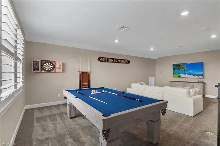 Rec room featuring carpet and billiards