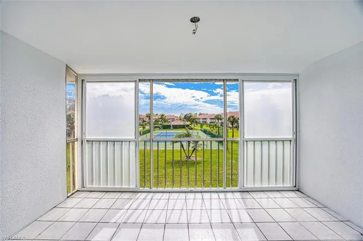 Unfurnished sunroom with a healthy amount of sunlight