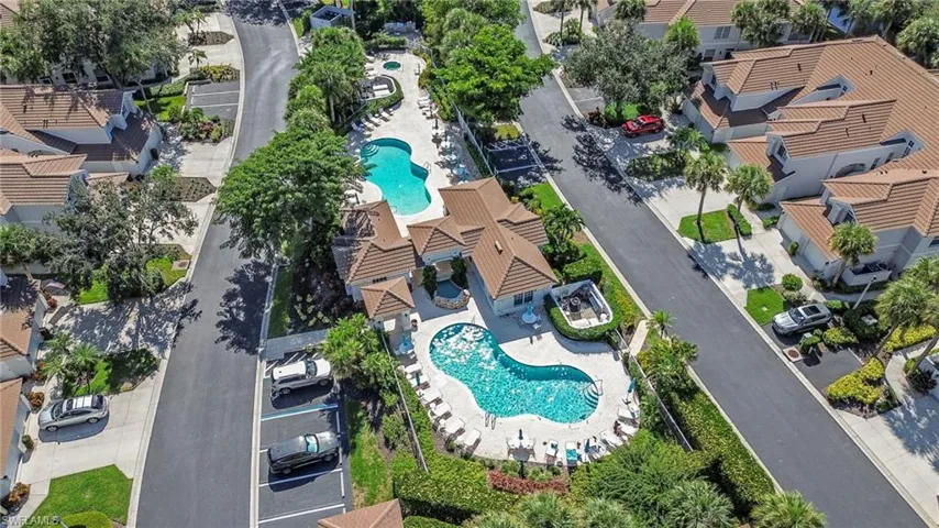 Aerial overview of property's location featuring a pool area