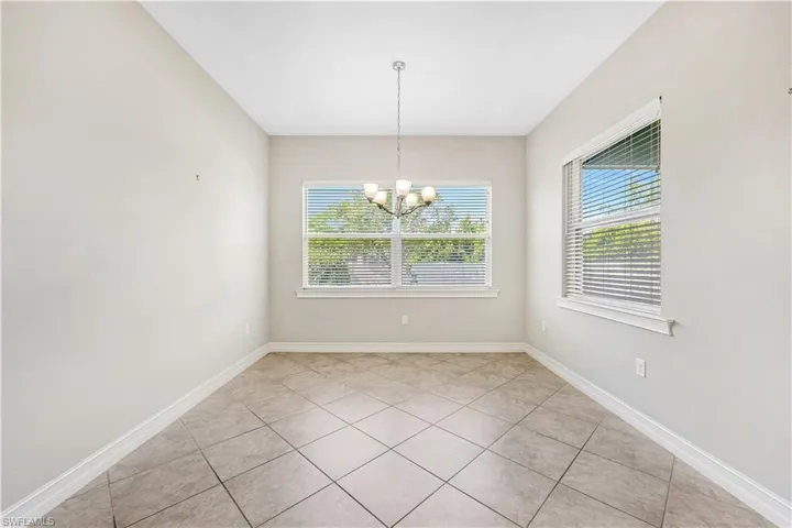 Dining area with diagonal set tile