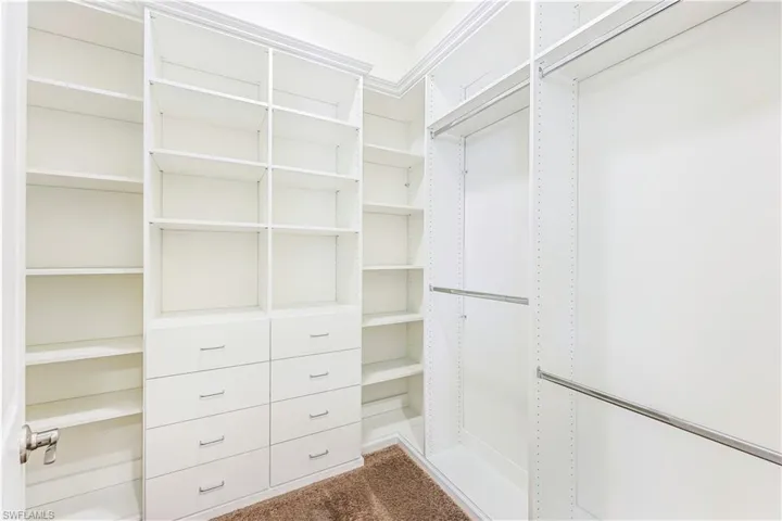Master bedroom closets by Closets by Design